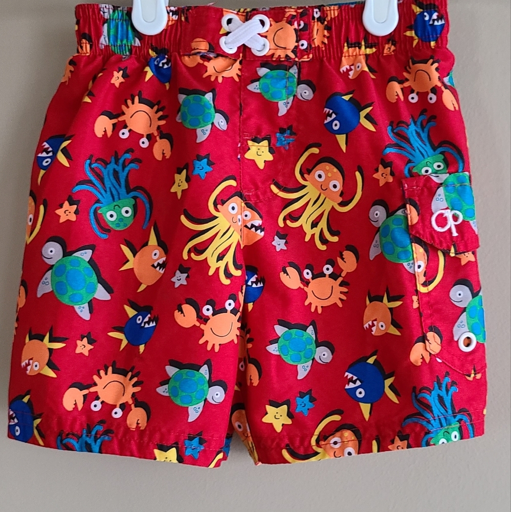 Red sea creature lined swim trunks